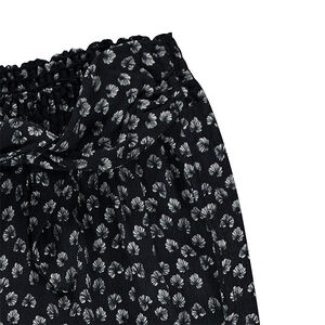 Άνετο παντελόνι με φλοράλ μοτίβο σε όλη την επιφάνεια 
