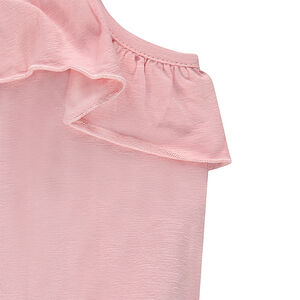 Μονόχρωμη ολόσωμη φόρμα-σορτς από ζέρσεϊ με βολάν  